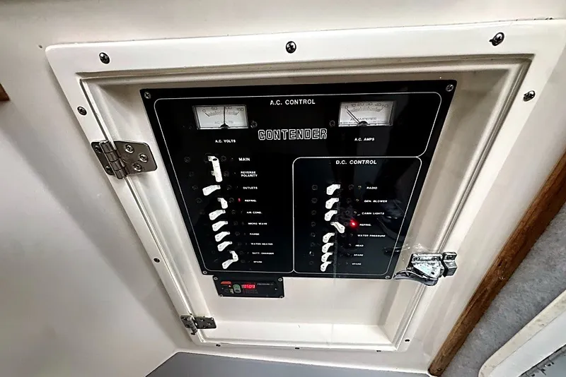 Slide: The Image of Electrical control panel of 2003 Contender 35 Side Console boat. - 16