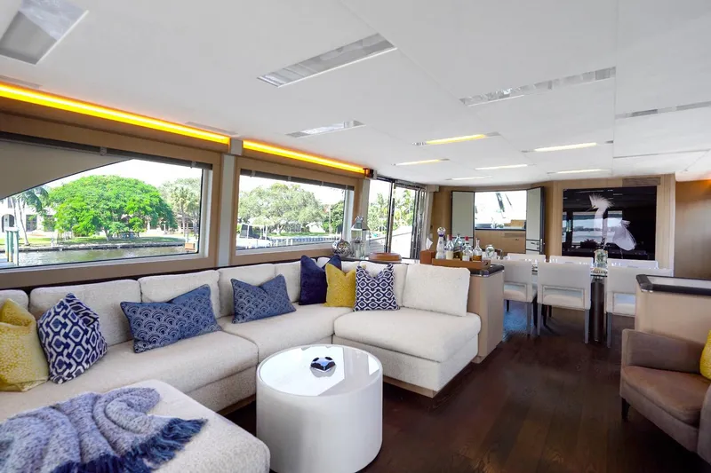 Slide: The Image of Luxurious interior of 2015 Monte Carlo Yachts MCY 86 with elegant seating and large windows. - 52