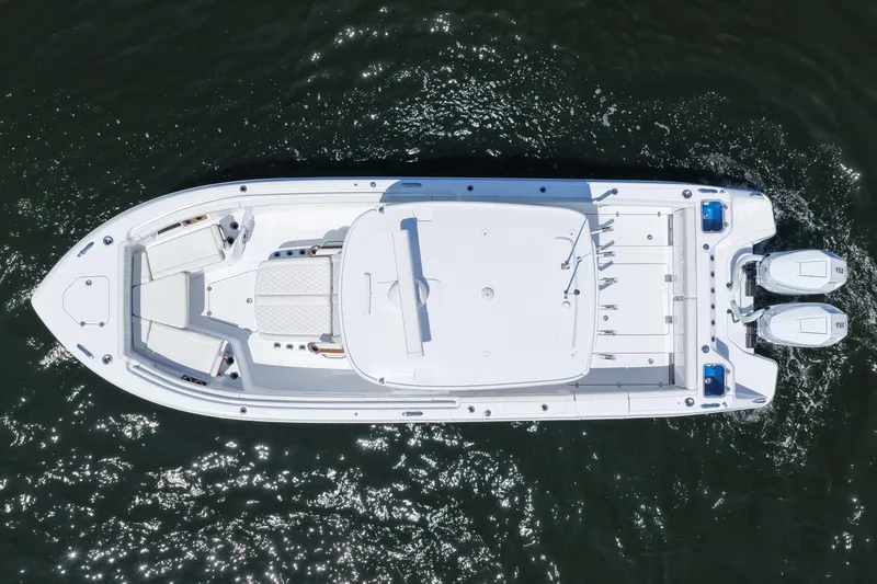 Slide: The Image of Aerial view of 2027 Everglades 315 Center Console boat on water. - 18