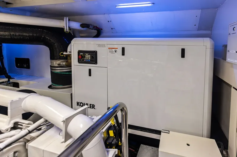 Slide: The Image of Engine room of 2022 Riva 110' Dolcevita yacht featuring Kohler generator. - 63