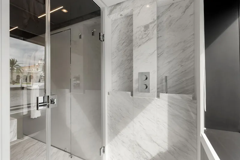 Slide: The Image of Luxurious marble bathroom interior on 2022 Riva 110' Dolcevita yacht. - 44
