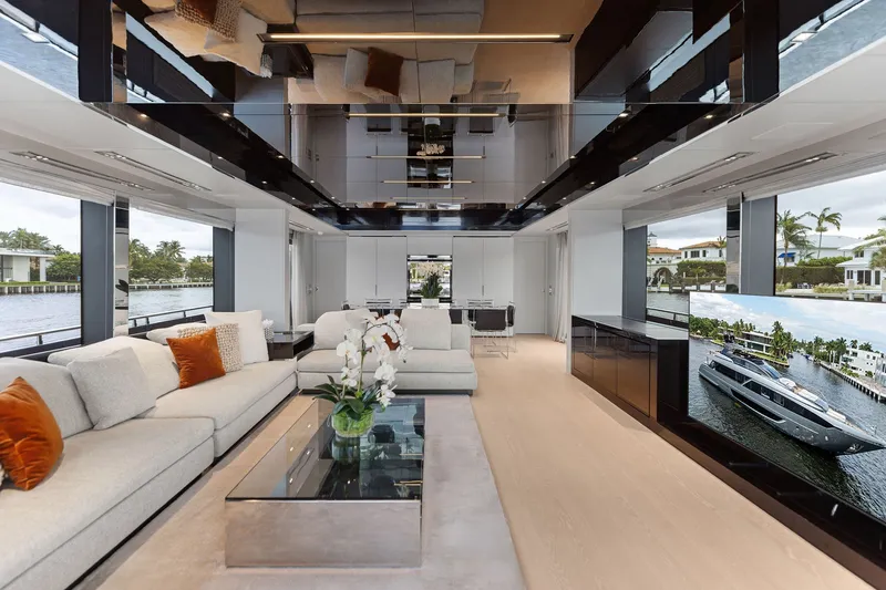 Slide: The Image of Luxurious interior of 2022 Riva 110' Dolcevita yacht with elegant seating and modern decor. - 25