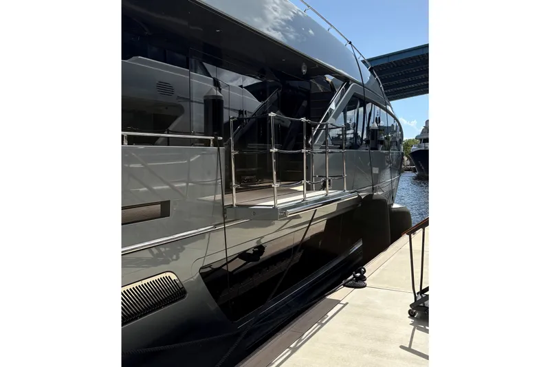 Slide: The Image of Luxury yacht Riva 110' Dolcevita 2022 docked, showcasing sleek design and modern features. - 9