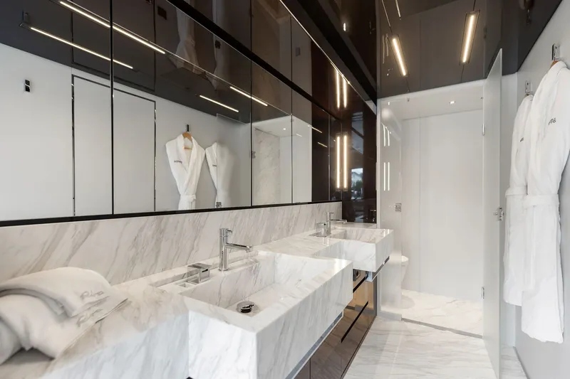 Slide: The Image of Luxurious bathroom on 2022 Riva 110' Dolcevita yacht with marble sinks and modern design. - 42