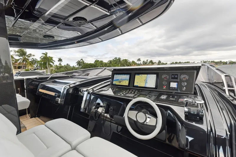 Slide: The Image of Luxurious 2022 Riva 110' Dolcevita yacht cockpit with advanced navigation systems and sleek design. - 19