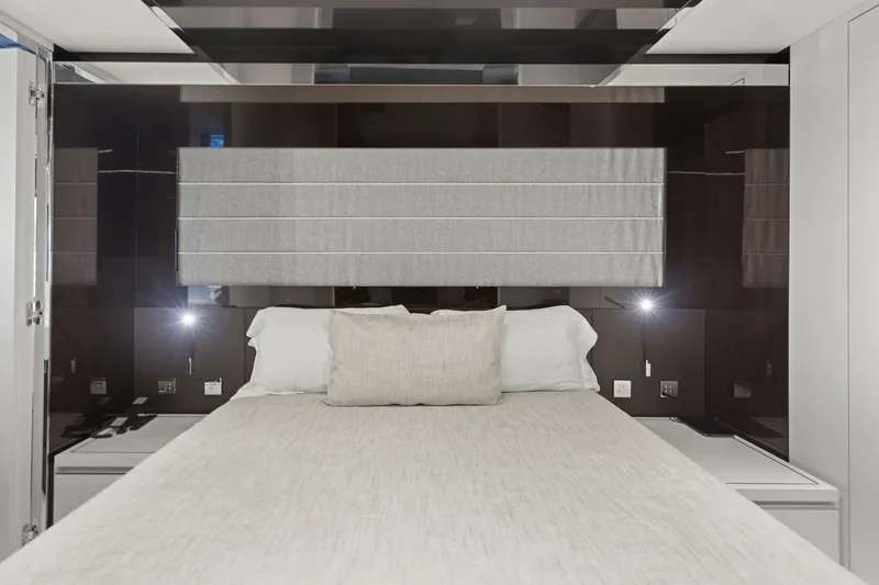 Slide: The Image of Luxurious bedroom interior of 2022 Riva 110' Dolcevita yacht with modern design elements. - 54