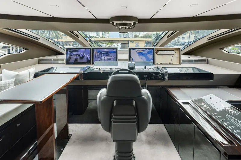 Slide: The Image of Luxurious helm of 2022 Riva 110' Dolcevita yacht with advanced navigation systems. - 30
