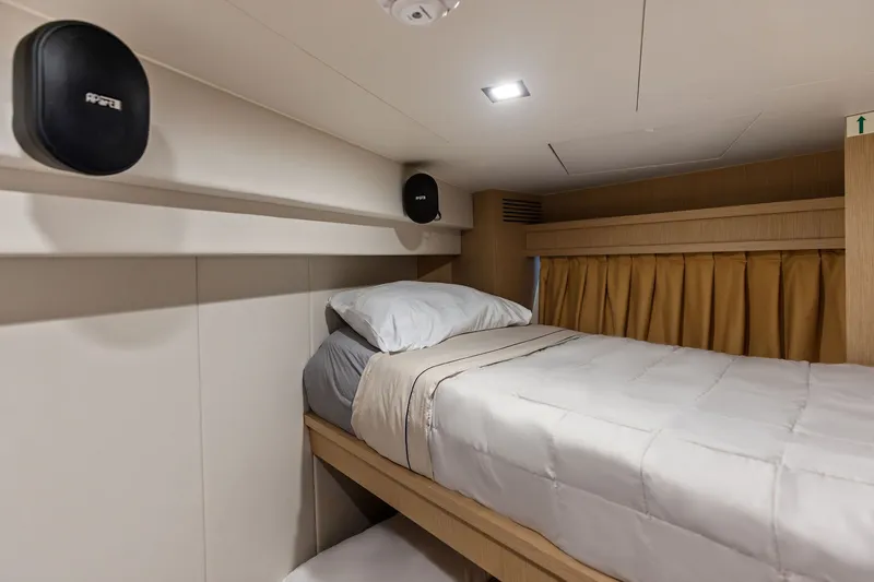 Slide: The Image of Luxurious cabin interior of 2022 Riva 110' Dolcevita yacht with cozy bedding. - 70