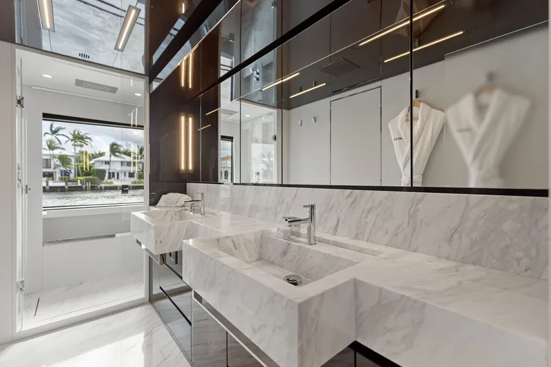 Slide: The Image of Luxurious bathroom on 2022 Riva 110' Dolcevita yacht with marble sinks and modern fixtures. - 43