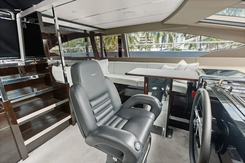 Slide: The Image of Luxurious interior of 2022 Riva 110' Dolcevita yacht with leather seating and modern design. - 31