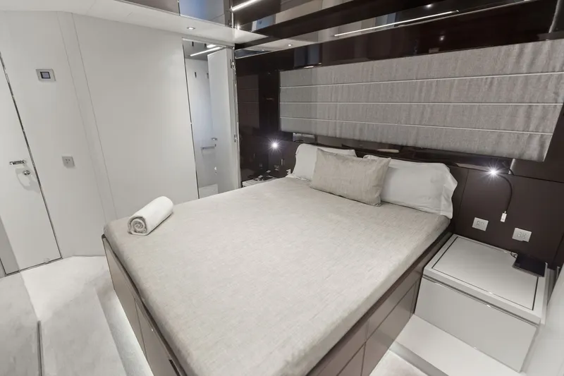 Slide: The Image of Luxurious bedroom interior on 2022 Riva 110' Dolcevita yacht, featuring modern design and elegant furnishings. - 53