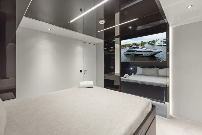 Slide: The Image of Luxurious bedroom interior on 2022 Riva 110' Dolcevita yacht with modern design and large TV. - 48