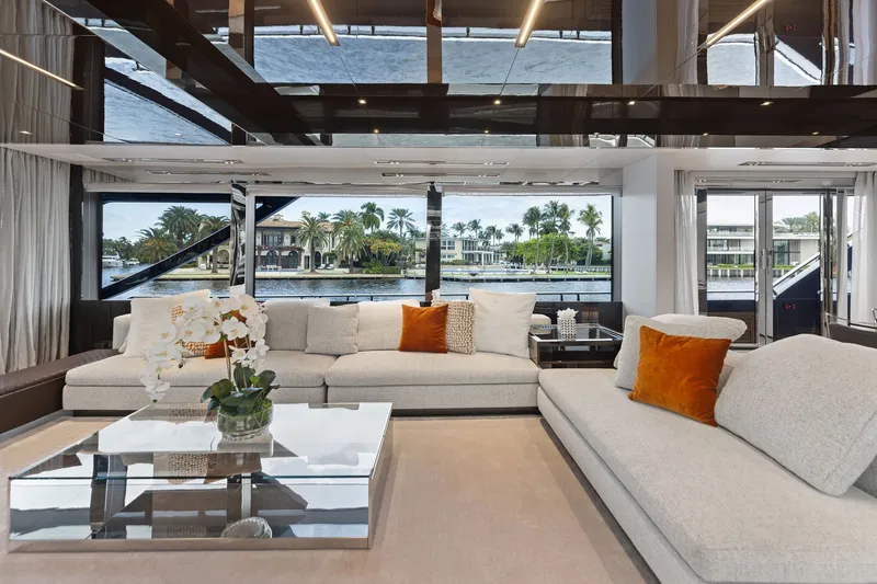 Slide: The Image of Luxurious interior of 2022 Riva 110' Dolcevita yacht with elegant seating and waterfront view. - 26