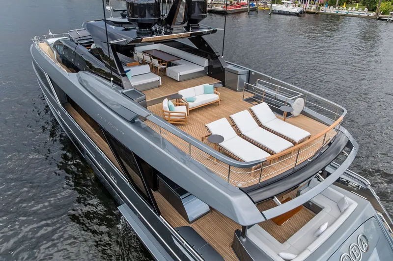 Slide: The Image of Luxurious 2022 Riva 110' Dolcevita yacht with spacious deck and elegant seating. - 6