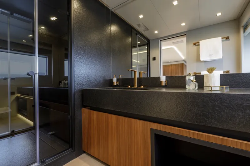 Slide: The Image of Luxurious bathroom interior of 2024 Mangusta GranSport 33 yacht with modern fixtures. - 34