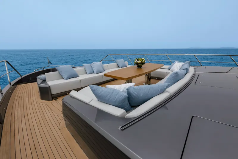Slide: The Image of Luxurious deck seating on 2024 Mangusta GranSport 33 yacht with ocean view. - 61