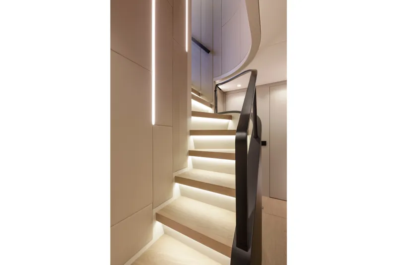 Slide: The Image of Elegant interior staircase with modern lighting in 2024 Mangusta GranSport 33 yacht. - 41