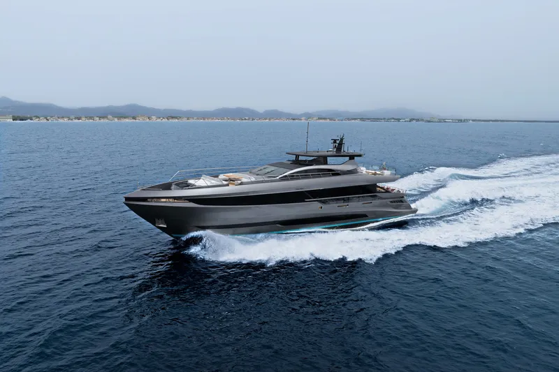 The Image of 2024 Mangusta GranSport 33 yacht cruising on open water. - 0