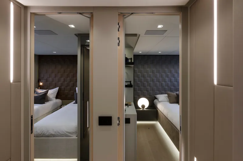 Slide: The Image of Luxurious interior of 2024 Mangusta GranSport 33 yacht with modern twin bedrooms. - 42