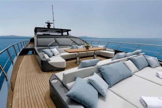 Slide: The Image of Luxurious 2024 Mangusta GranSport 33 yacht deck with elegant seating and ocean view. - 43