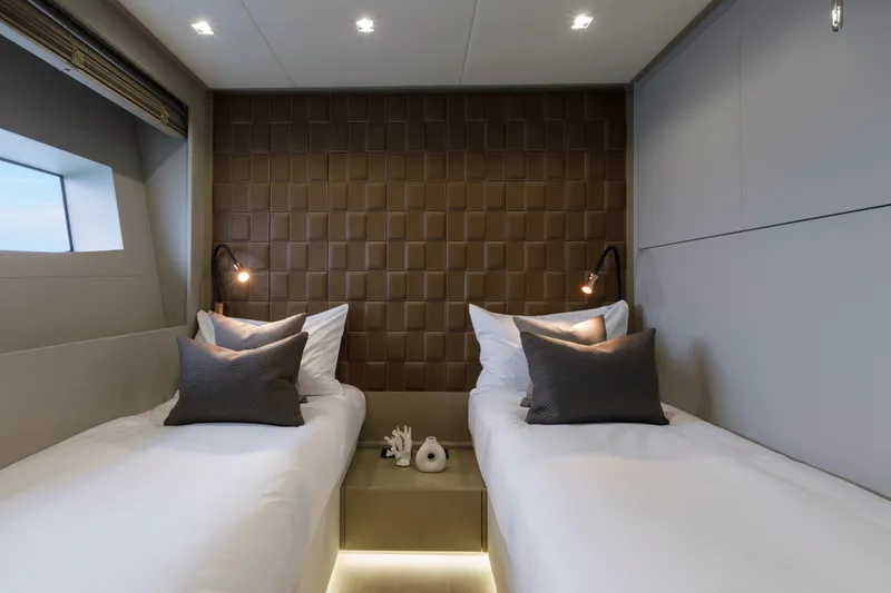 Slide: The Image of Luxurious twin cabin interior of 2024 Mangusta GranSport 33 yacht with modern design. - 52
