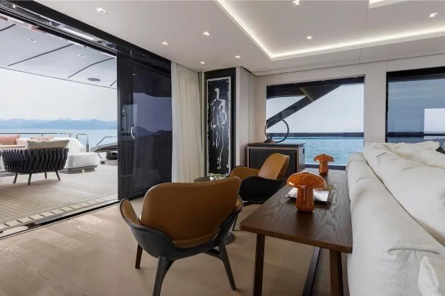 Slide: The Image of Luxurious interior of 2024 Mangusta GranSport 33 yacht with ocean view and modern furnishings. - 14