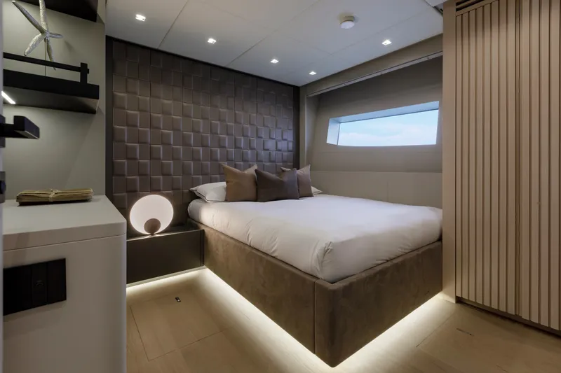 Slide: The Image of Luxurious bedroom interior of 2024 Mangusta GranSport 33 yacht with modern design elements. - 48