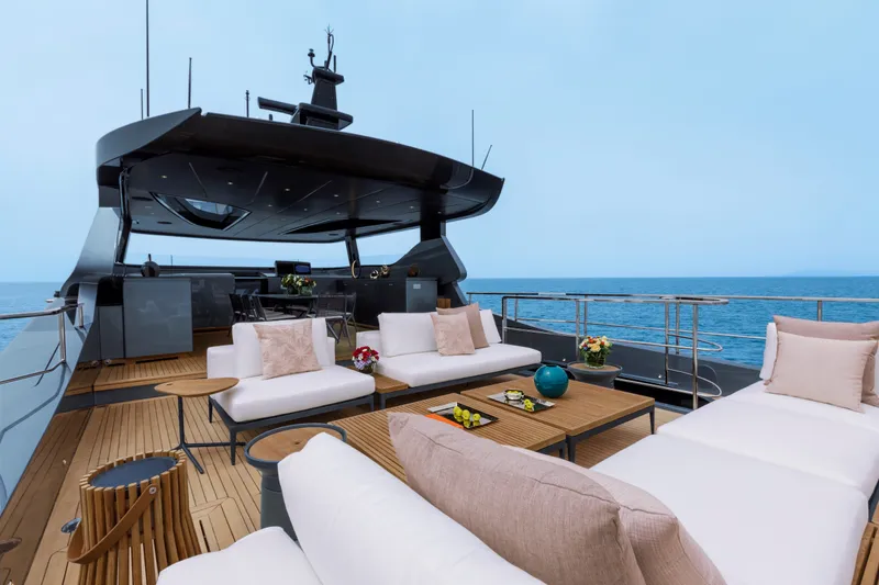 Slide: The Image of Luxurious deck of 2024 Mangusta GranSport 33 yacht with elegant seating and ocean view. - 58
