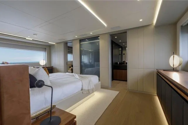 Slide: The Image of Luxurious bedroom interior of 2024 Mangusta GranSport 33 yacht, featuring modern design and elegant furnishings. - 22