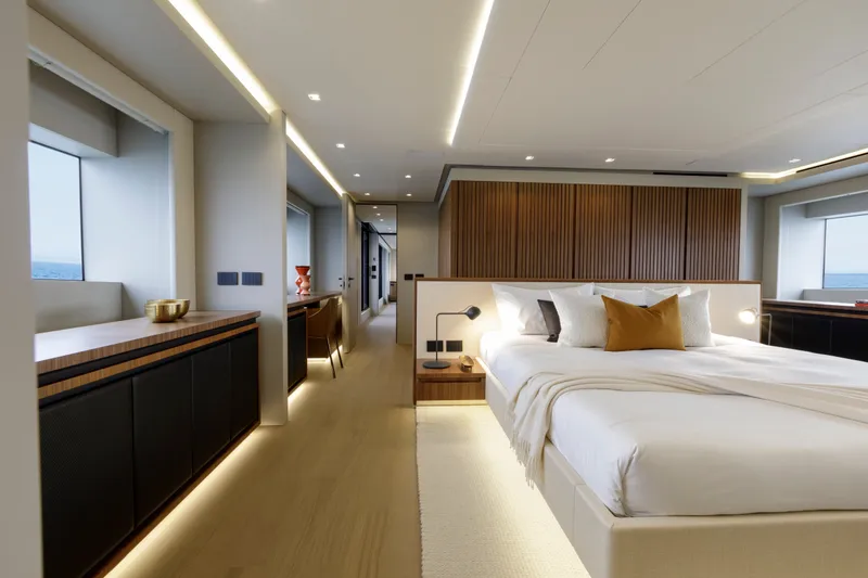 Slide: The Image of Luxurious bedroom interior of 2024 Mangusta GranSport 33 yacht, featuring modern design and ocean views. - 31