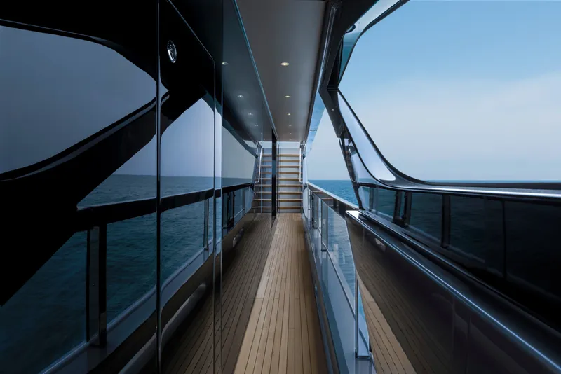 Slide: The Image of Luxurious 2024 Mangusta GranSport 33 yacht deck with ocean view and sleek design. - 19