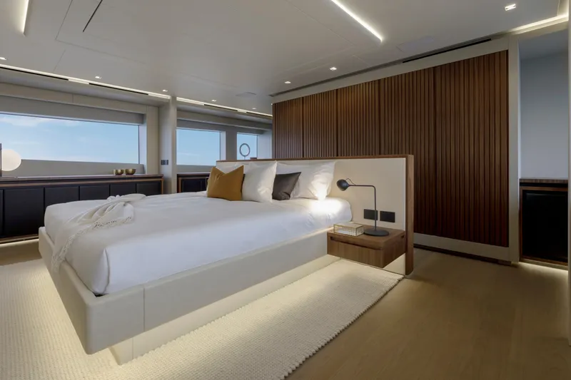 Slide: The Image of Luxurious bedroom interior of 2024 Mangusta GranSport 33 yacht with modern design elements. - 32