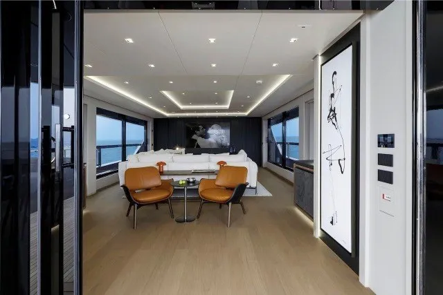 Slide: The Image of Luxurious interior of 2024 Mangusta GranSport 33 yacht with modern furnishings and ocean views. - 15