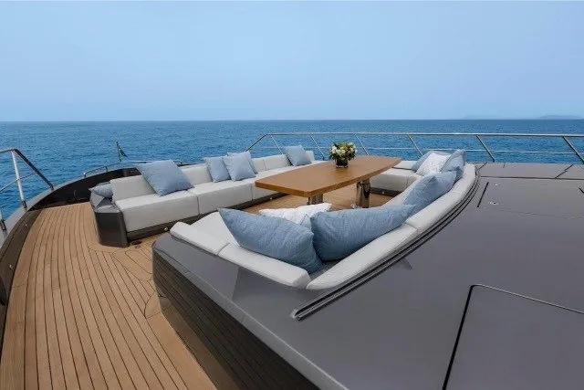 Slide: The Image of Luxurious 2024 Mangusta GranSport 33 yacht deck with elegant seating and ocean view. - 40