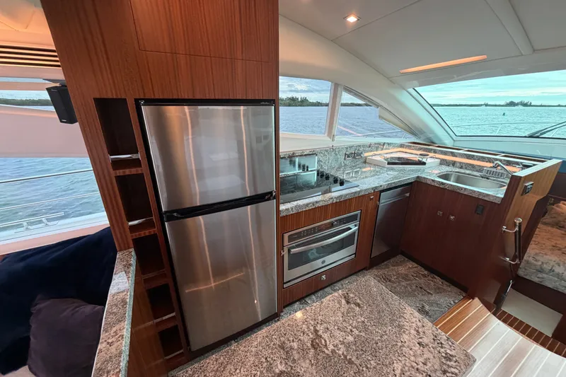 Slide: The Image of Luxurious kitchen interior on 2020 Horizon E56 yacht with modern appliances and ocean view. - 30