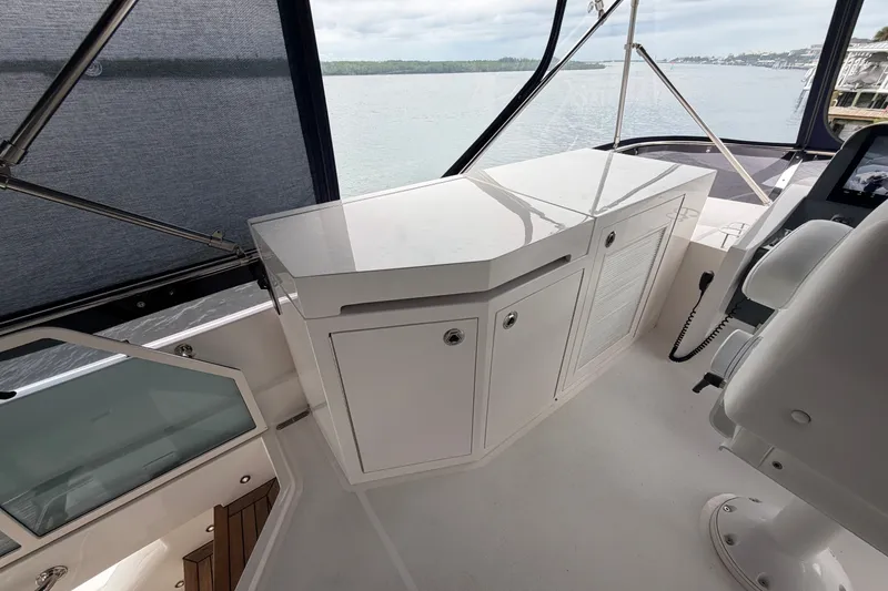 Slide: The Image of Luxurious interior of 2020 Horizon E56 yacht with sleek cabinetry and panoramic water views. - 82
