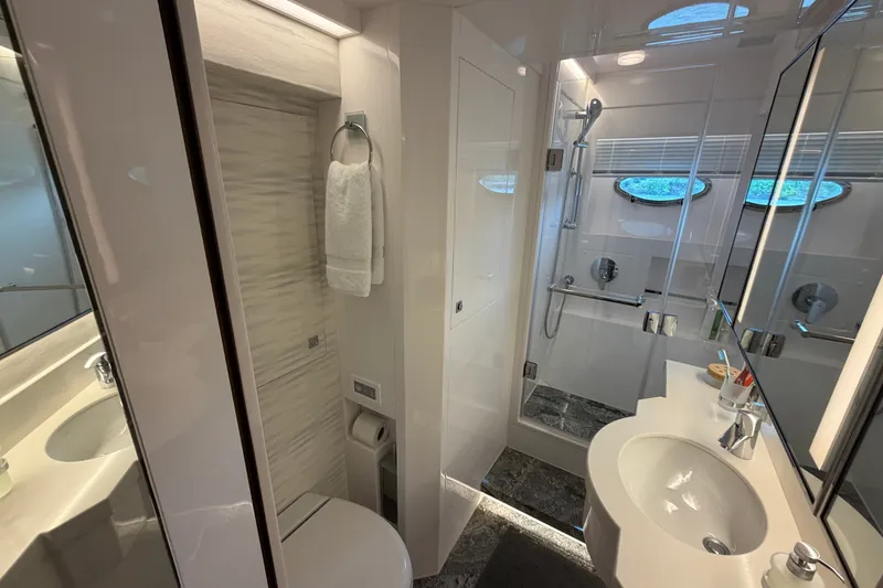 Slide: The Image of Luxurious bathroom in 2020 Horizon E56 yacht with modern fixtures and elegant design. - 58