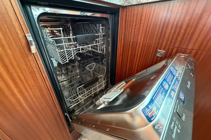 Slide: The Image of Open dishwasher in wooden kitchen, Horizon E56 model, 2020. - 44