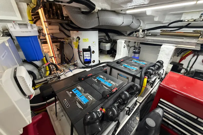 Slide: The Image of Engine room of 2020 Horizon E56 yacht with batteries and mechanical components. - 94