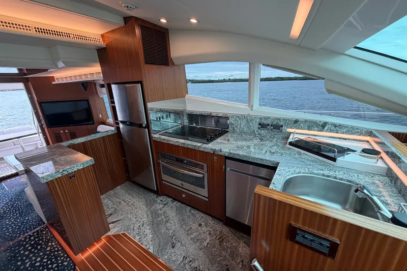 Slide: The Image of Luxurious kitchen interior on 2020 Horizon E56 yacht with modern appliances and ocean view. - 31