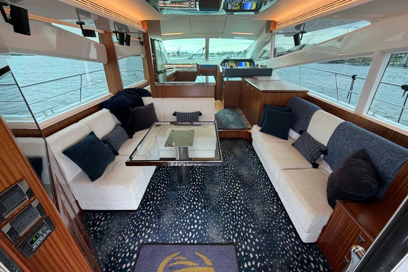 Slide: The Image of Luxurious interior of 2020 Horizon E56 yacht with plush seating and elegant decor. - 26