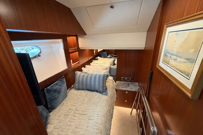 Slide: The Image of Luxurious cabin interior of 2020 Horizon E56 yacht with cozy bedding and elegant decor. - 74