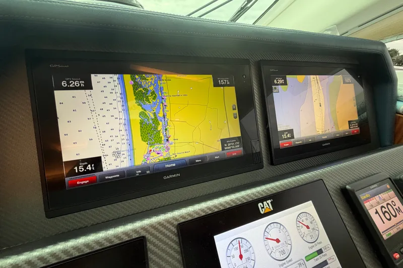 Slide: The Image of Dashboard of a 2020 Horizon E56 yacht with Garmin navigation displays. - 36