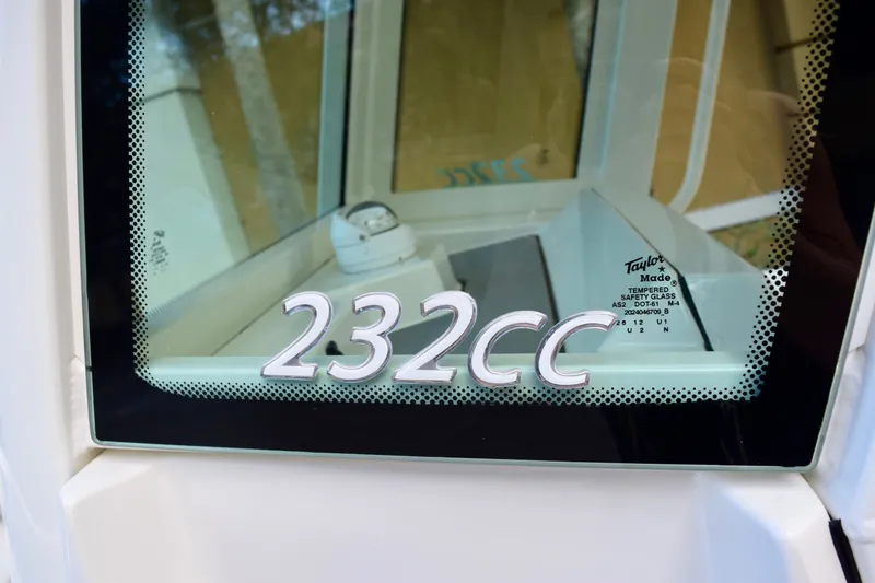 Slide: The Image of Sailfish 232 CC boat window with model number, 2026 edition. - 13