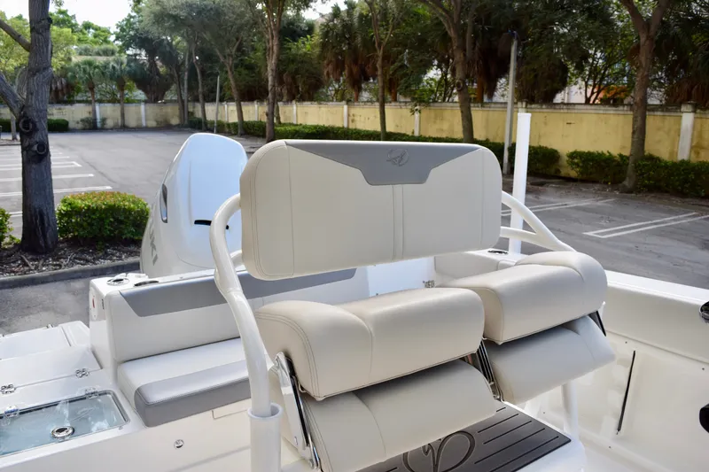 Slide: The Image of 2026 Sailfish 232 CC boat interior with comfortable seating and modern design. - 7