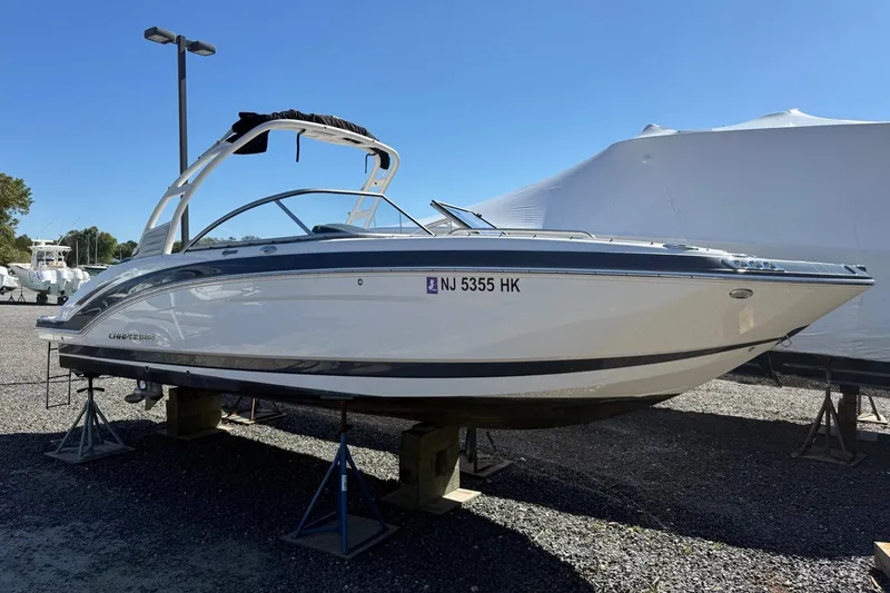 The Image of 2016 Chaparral 250 Suncoast boat on stands, outdoor display. - 0