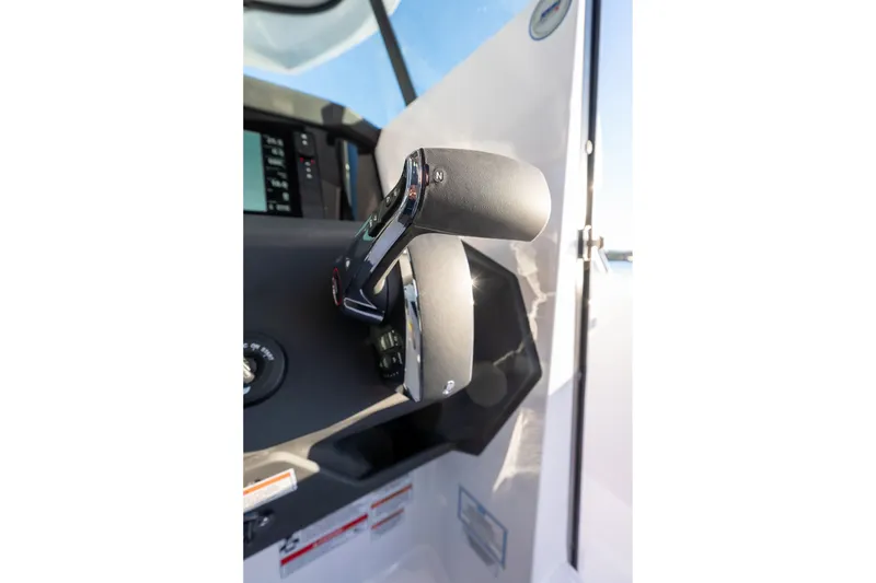 Slide: The Image of Throttle control of 2026 Axopar 29 XC Cross Cabin boat, showcasing modern design. - 17