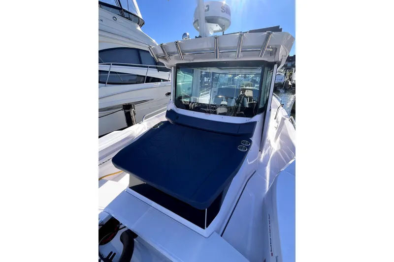 Slide: The Image of 2026 Axopar 29 XC Cross Cabin boat with sleek design and spacious deck. - 38