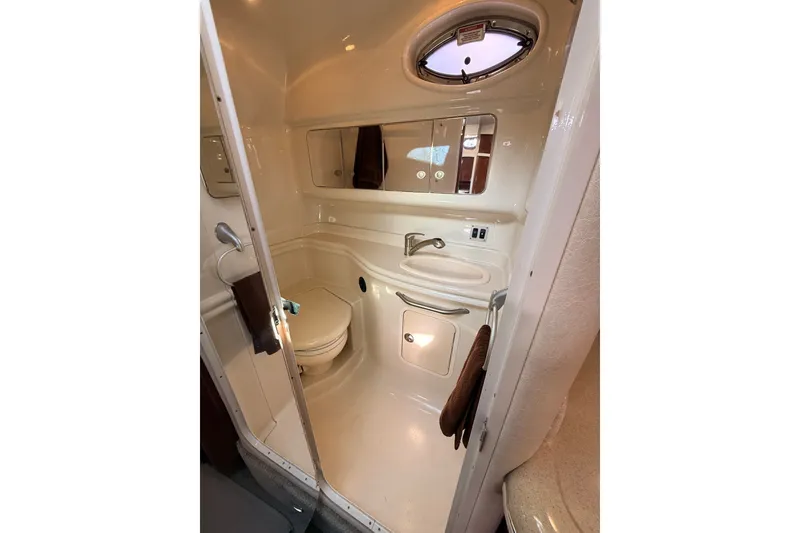 Slide: The Image of Bathroom interior of 2008 Sea Ray 340 Sundancer yacht, featuring compact design and amenities. - 36