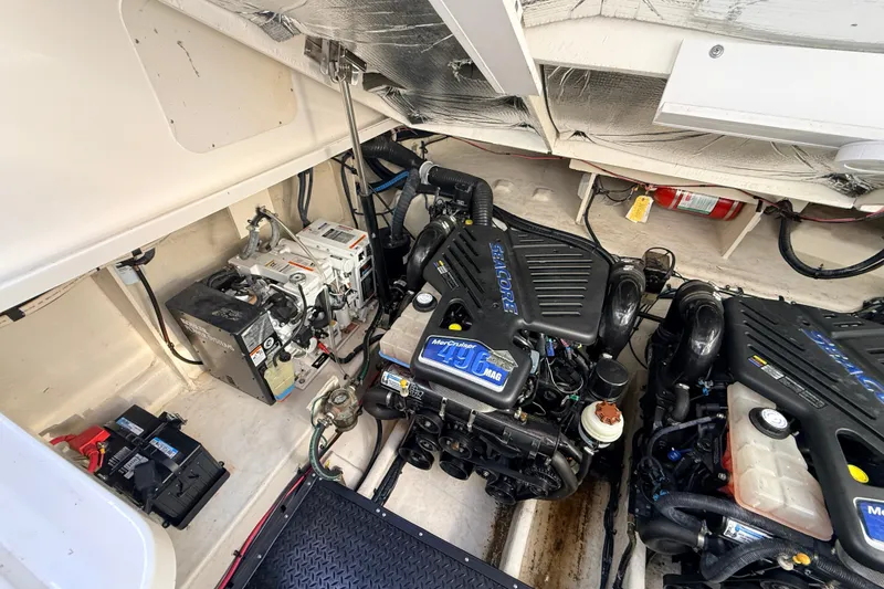 Slide: The Image of Engine compartment of a 2008 Sea Ray 340 Sundancer with twin MerCruiser engines. - 38